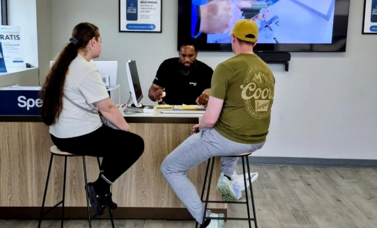 Actual Clarksville Internet Deals owner helping customers at the store